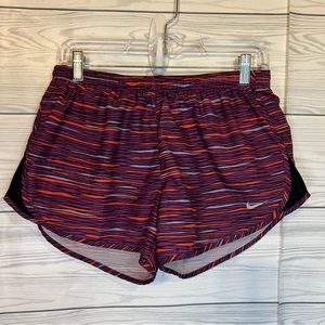 Med.  Nike running shorts